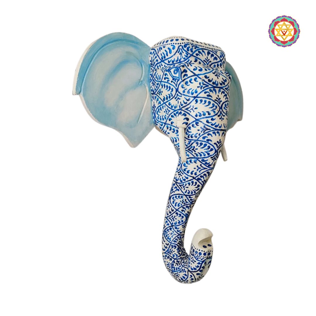 Close-up of elephant head wall art showing fine paintwork and polish
