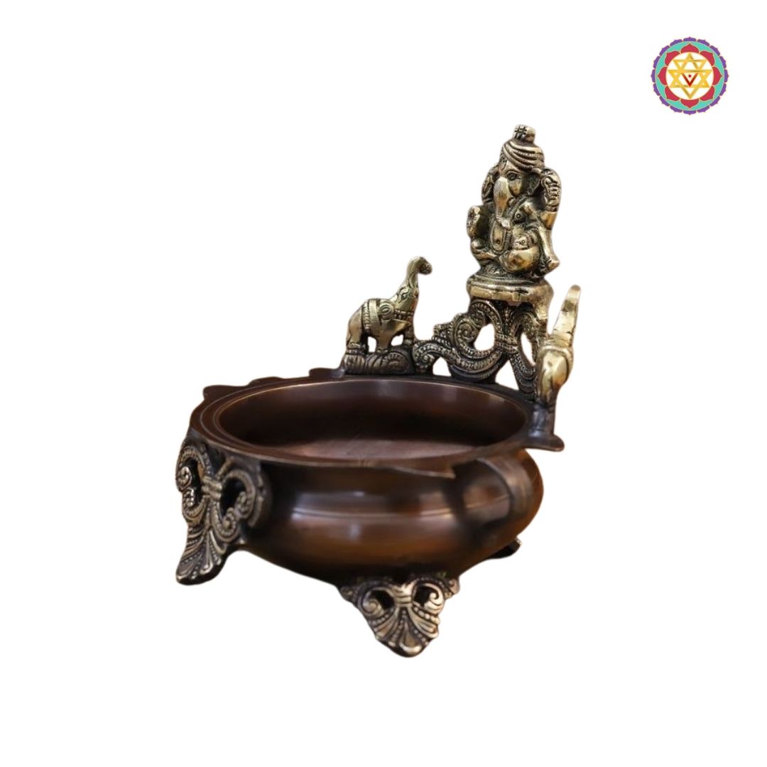 side view of Ganesh urli bowl highlighting engraved patterns and copper tone