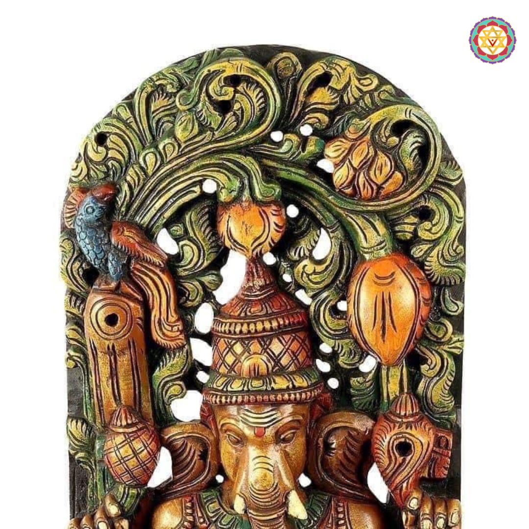 Front view of Ganesha wooden statue with prabhavali — intricate carving of canopy and lotus, handcrafted antique finish