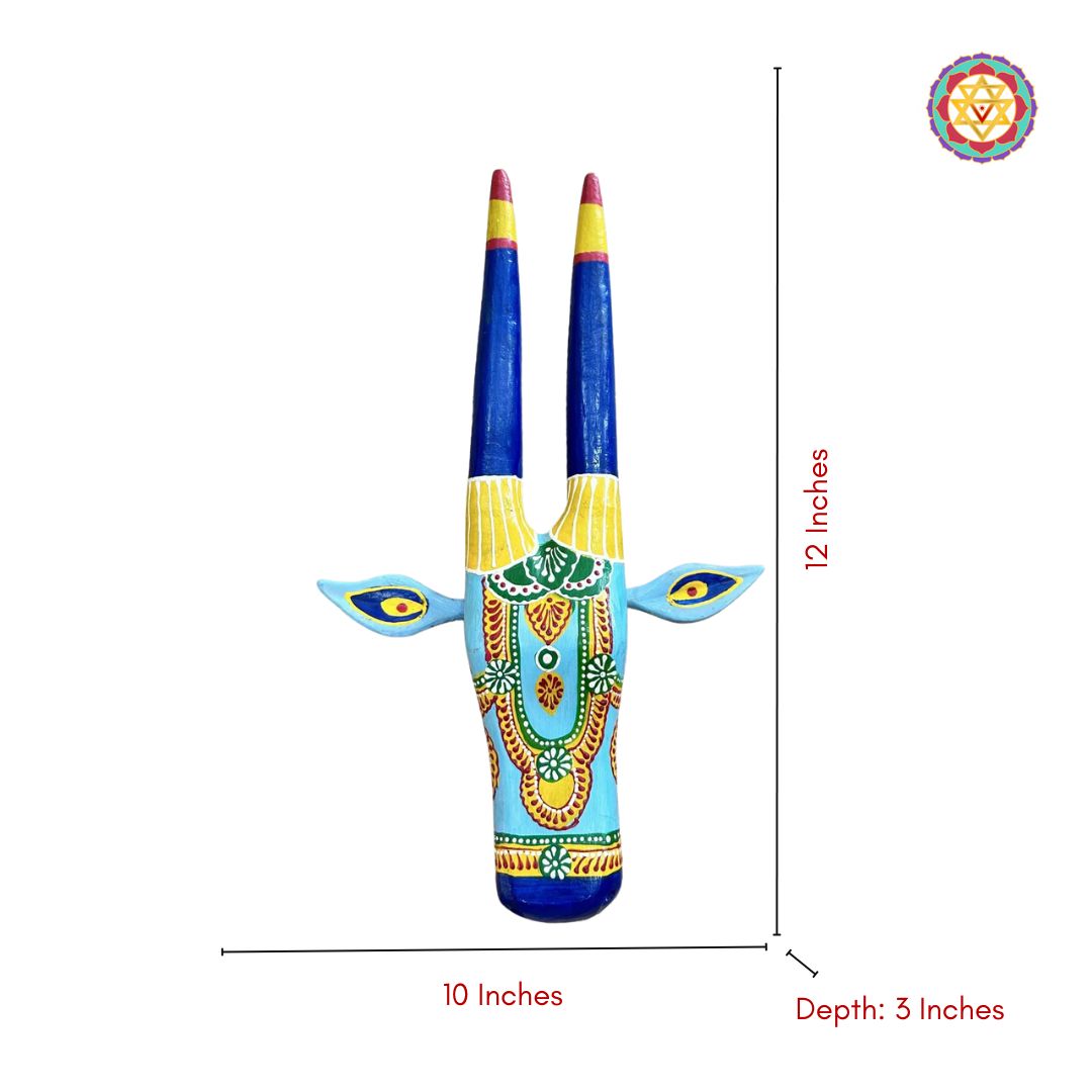 angled display of carved blue and yellow cow head showcasing artistic wood craftsmanship