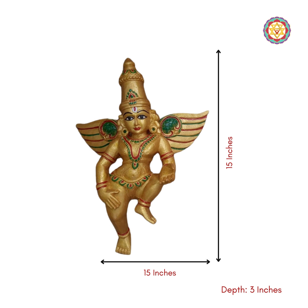 Side view of wall-mounted Gandharva wooden sculpture — slender depth profile, carved halo and flowing garment detailing in gold and brown tones