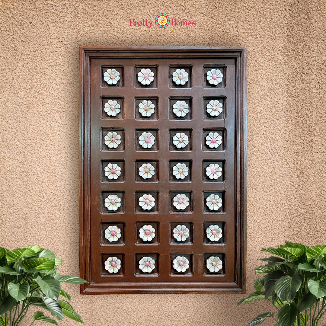 Hand-carved wooden floral wall panel front view