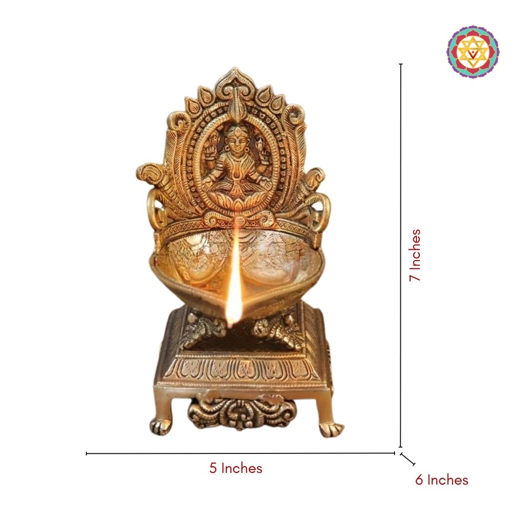 side view of Mahalakshmi diya lamp showcasing ornate traditional work