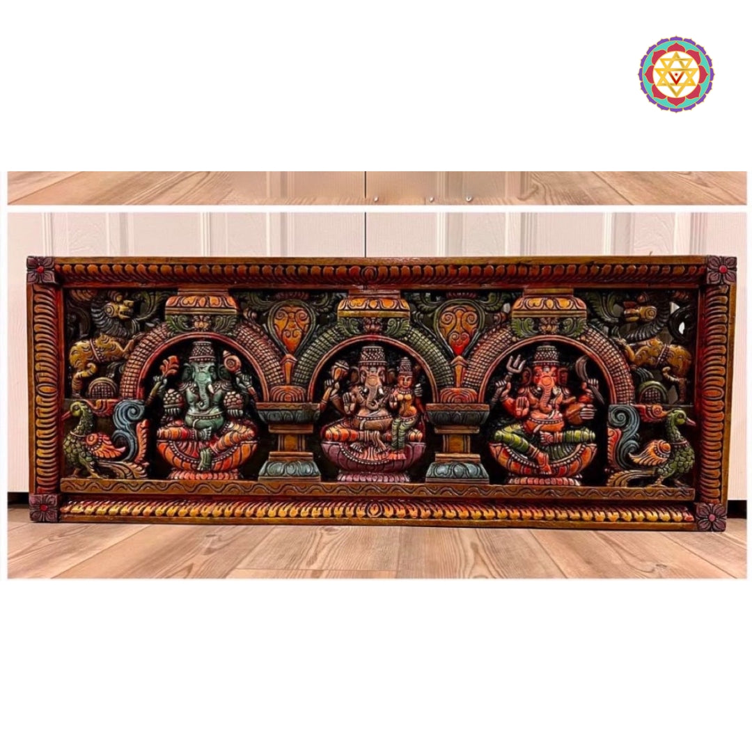 Horizontal wooden pooja room panel featuring carved Ganeshas