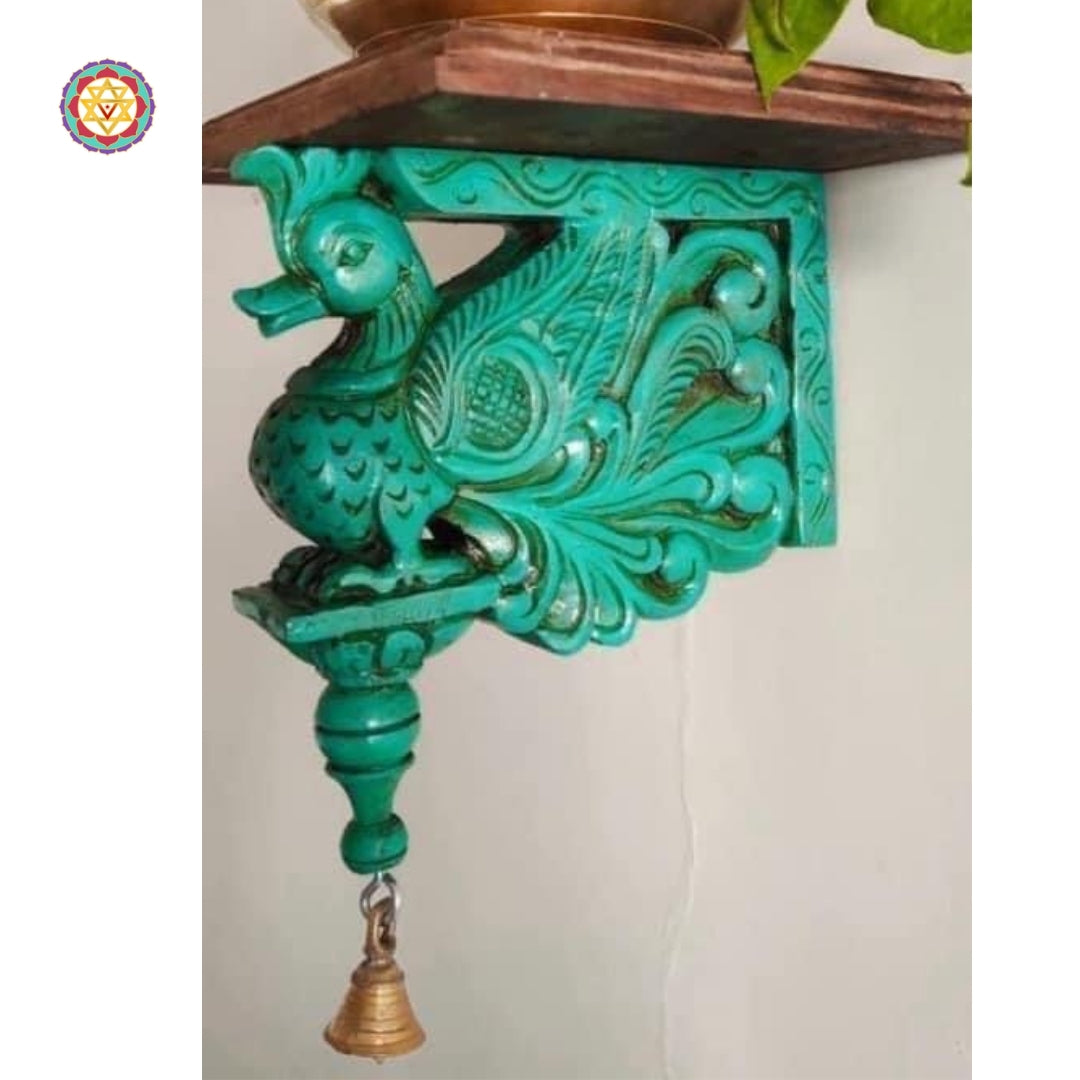 Close-up view of wooden annam wall bracket showing delicate swan carvings and vine pattern