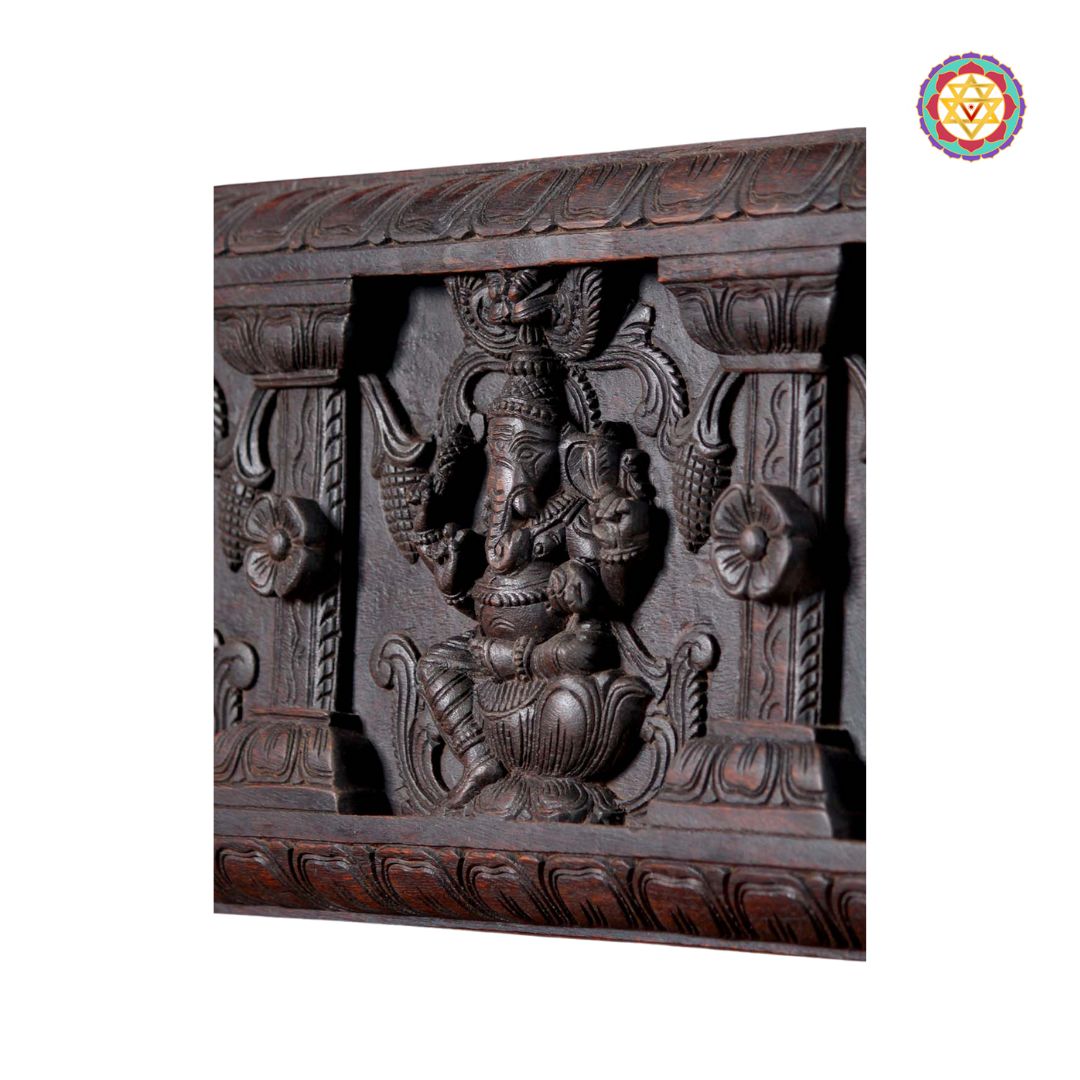 Side angle of wood panel showing Chettinad style pillar carvings