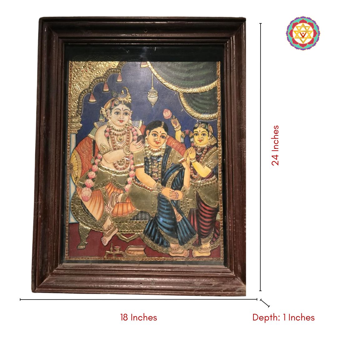 Antique tanjore painting showing Krishna with Radha in vibrant detail