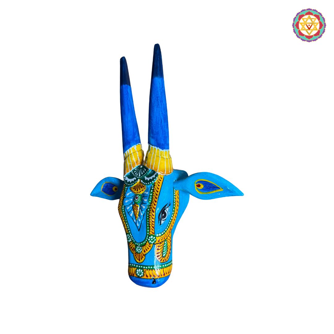 Top view of handcarved blue Nandi cow head wooden decor