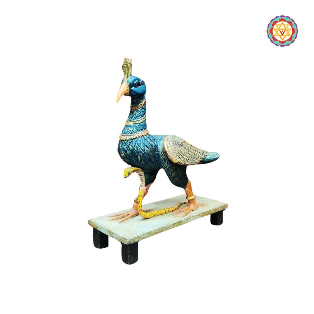 close-up of colourful peacock feather carving