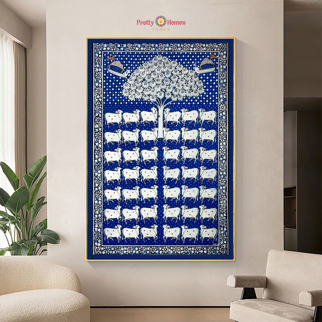 Hand-painted pichwai with blue cows under tree, contemporary pichwai painting.