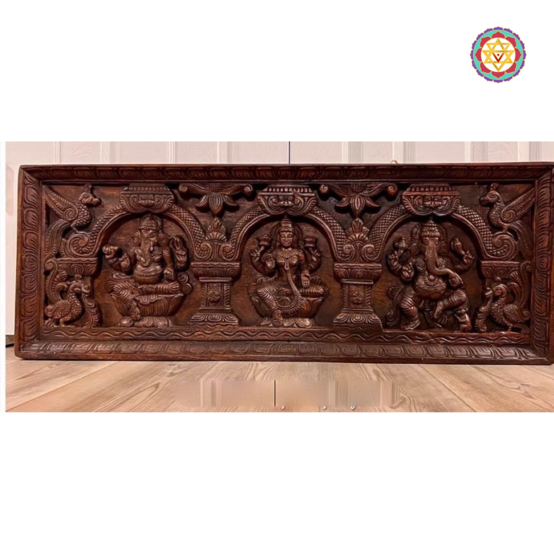Vagai wood panel featuring Maha Ganapati, Lakshmi, and Nritya Ganapati