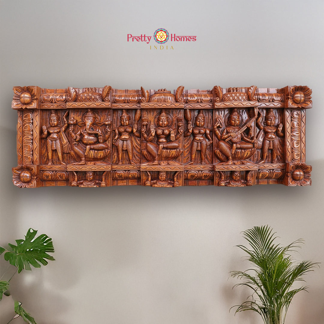Vintage wood carved panel of Lord Ganesha Lakshmi and Saraswati with worshippers
