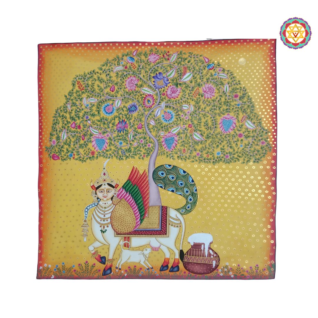 artistically painted kamdhenu surrounded by floral and divine motifs