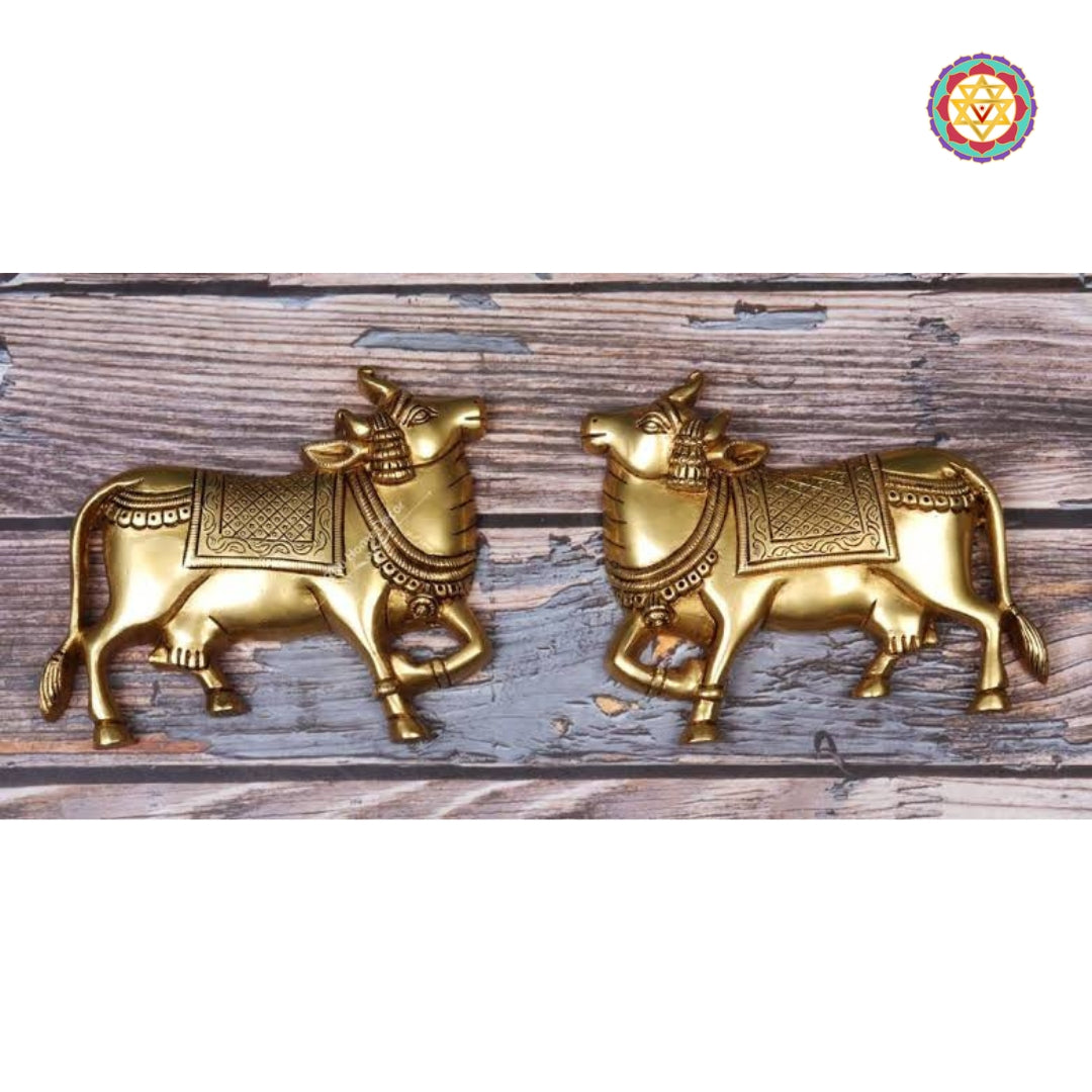Sacred brass cow wall art symbolizing divinity and grace