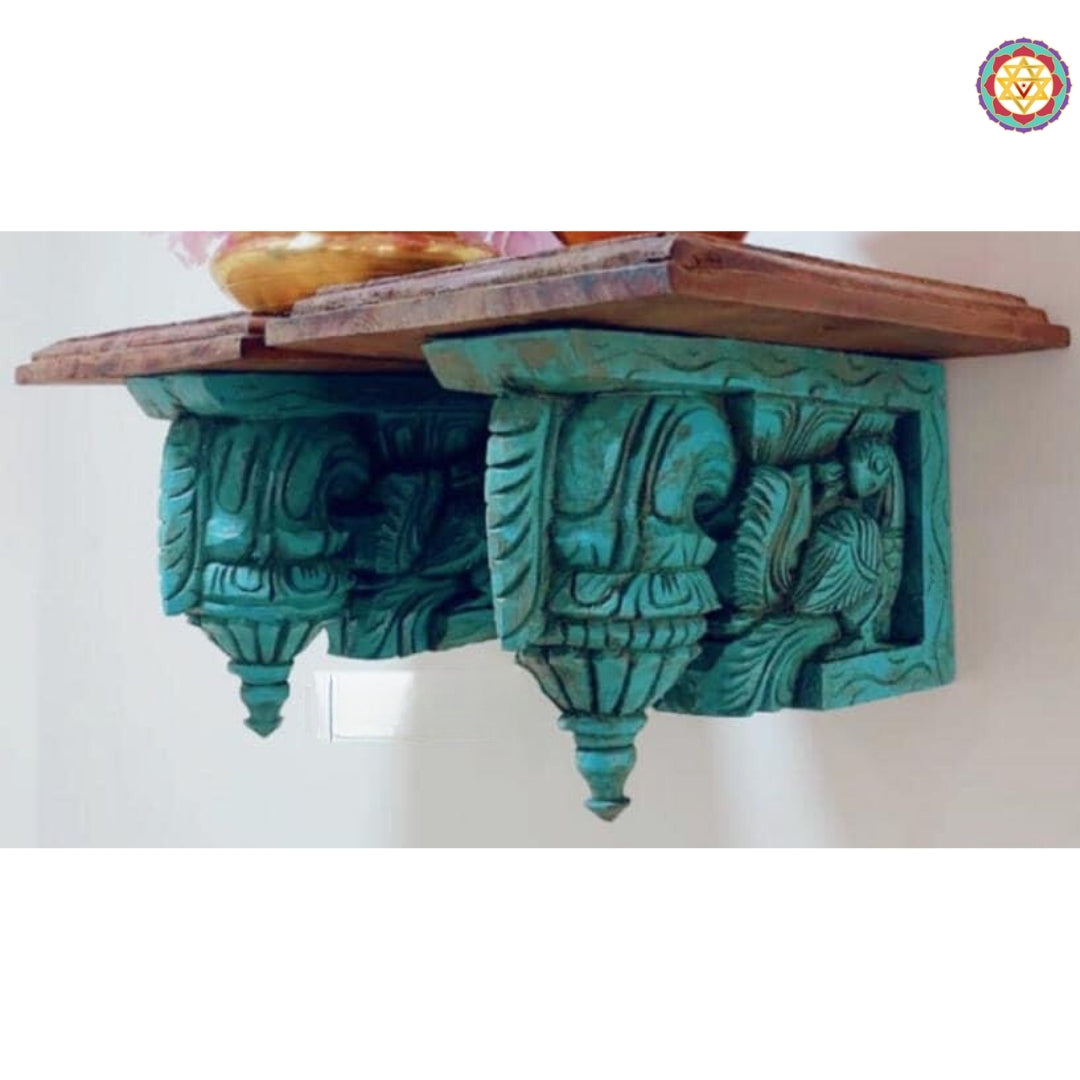 Side profile of wooden bodhil bracket showing annam carving with layered floral detailing and antique polish