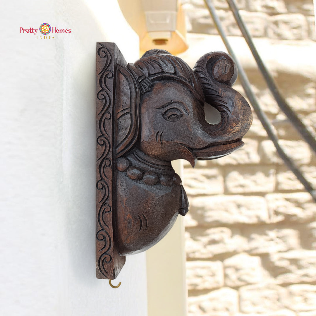 Hand carved teak elephant wall bracket