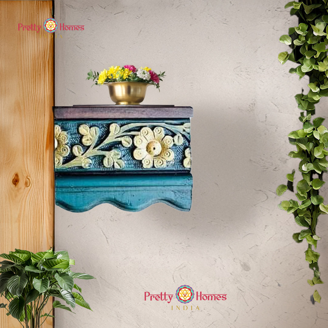 handcrafted wooden wall shelf with floral carving and antique finish