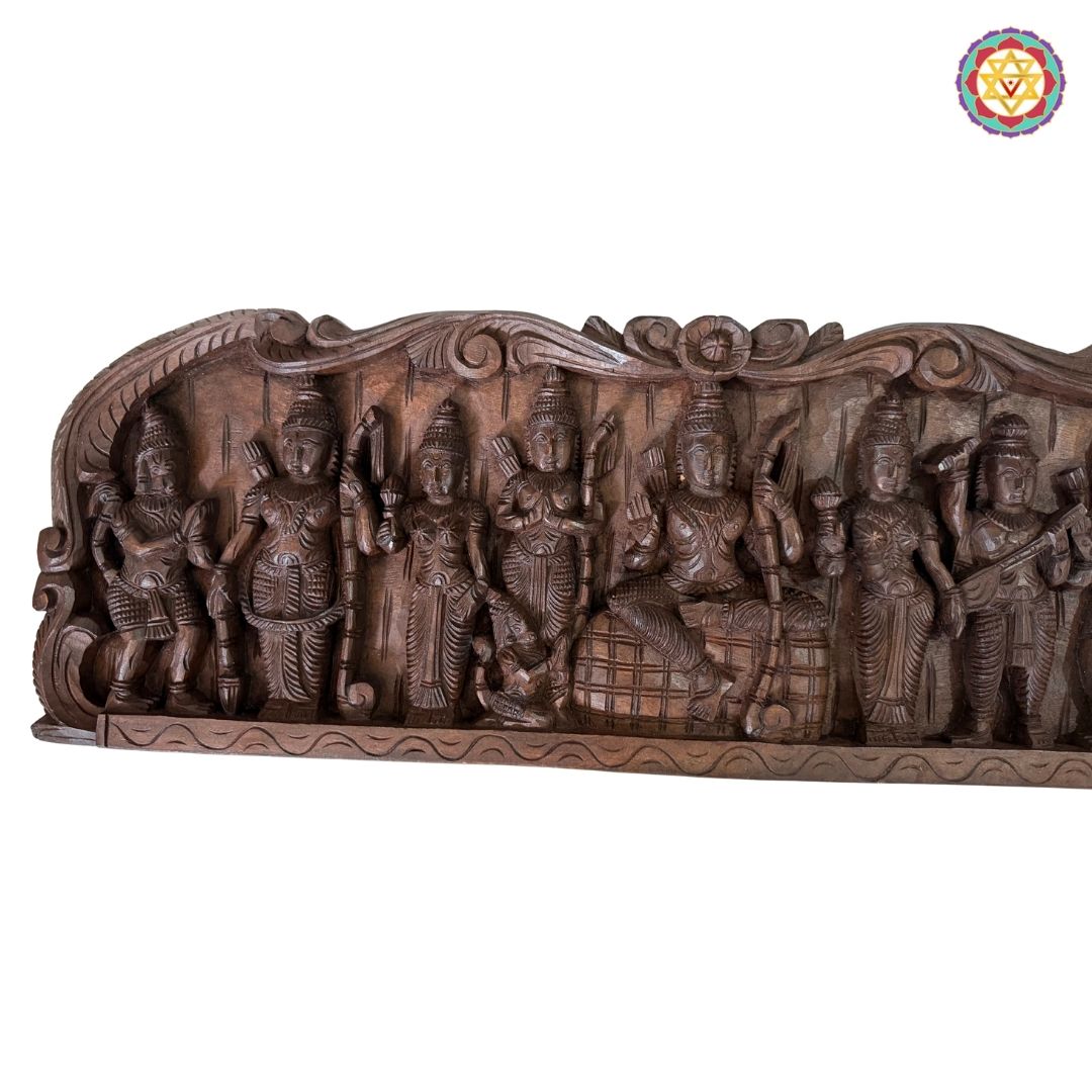 Close view of Ramayan wooden panel showing intricate mythological carving