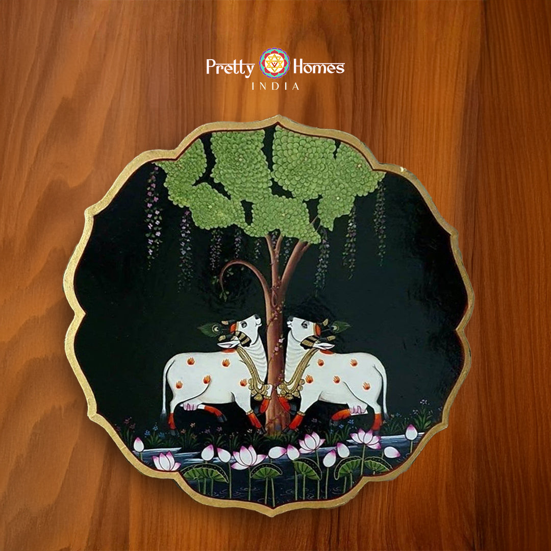 Hand painted petal shaped wall plate -pichwai cows with tree of life., pichwai painting in luxurious palette, hand-painted for hallway décor