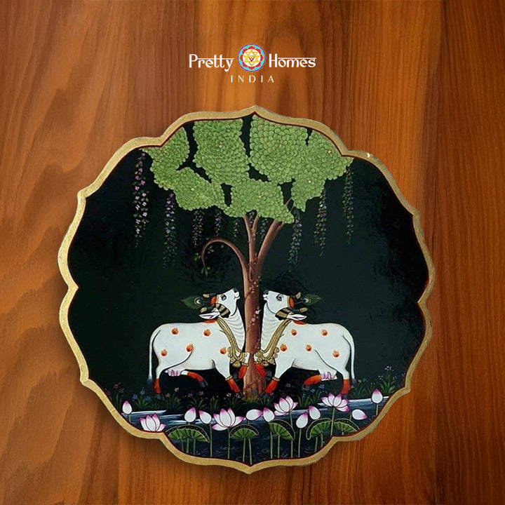 Hand painted petal shaped wall plate -pichwai cows with tree of life., pichwai painting in luxurious palette, hand-painted for hallway décor