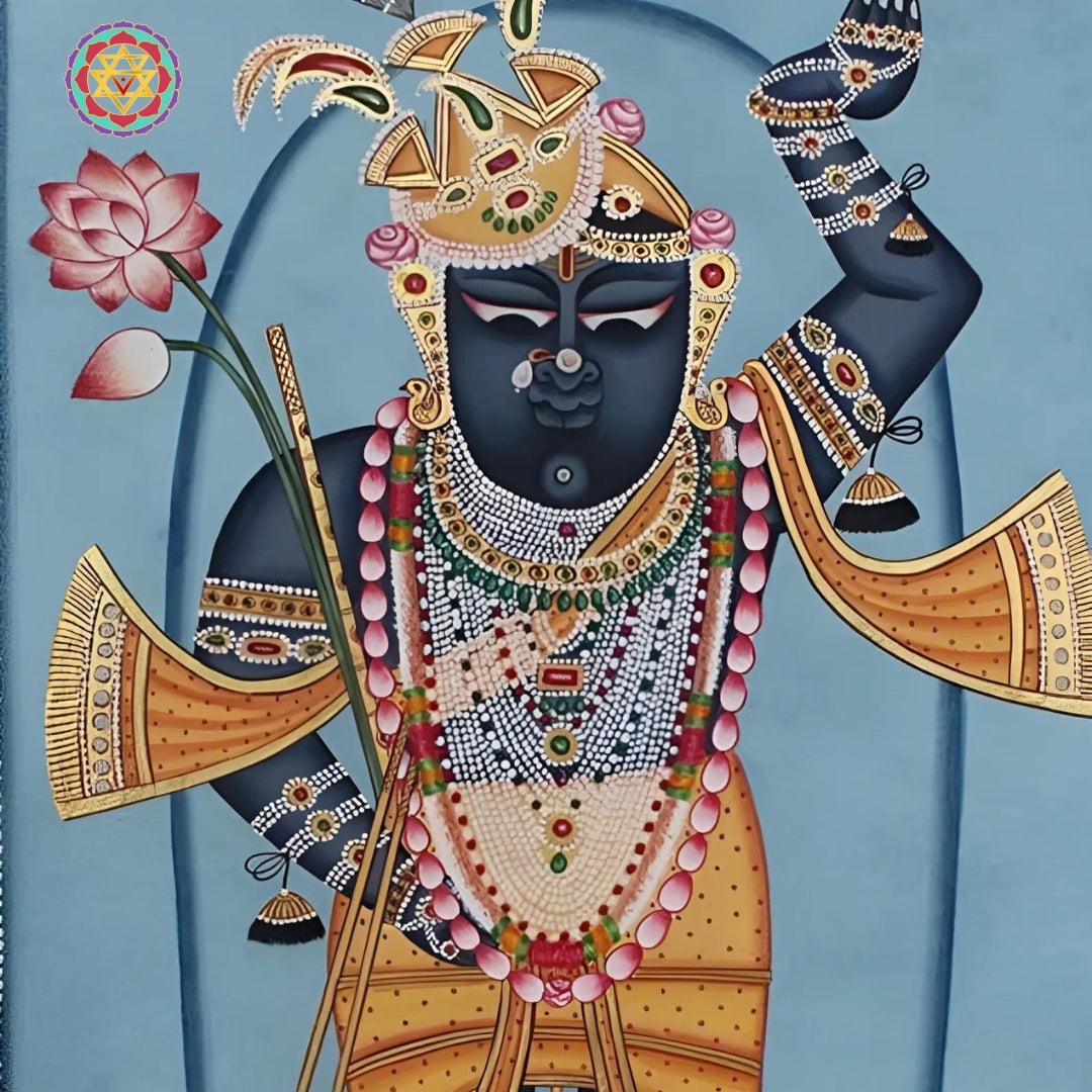 Detailed Pichwai painting portraying the festival of Janmashtami with vibrant celebratory scenes