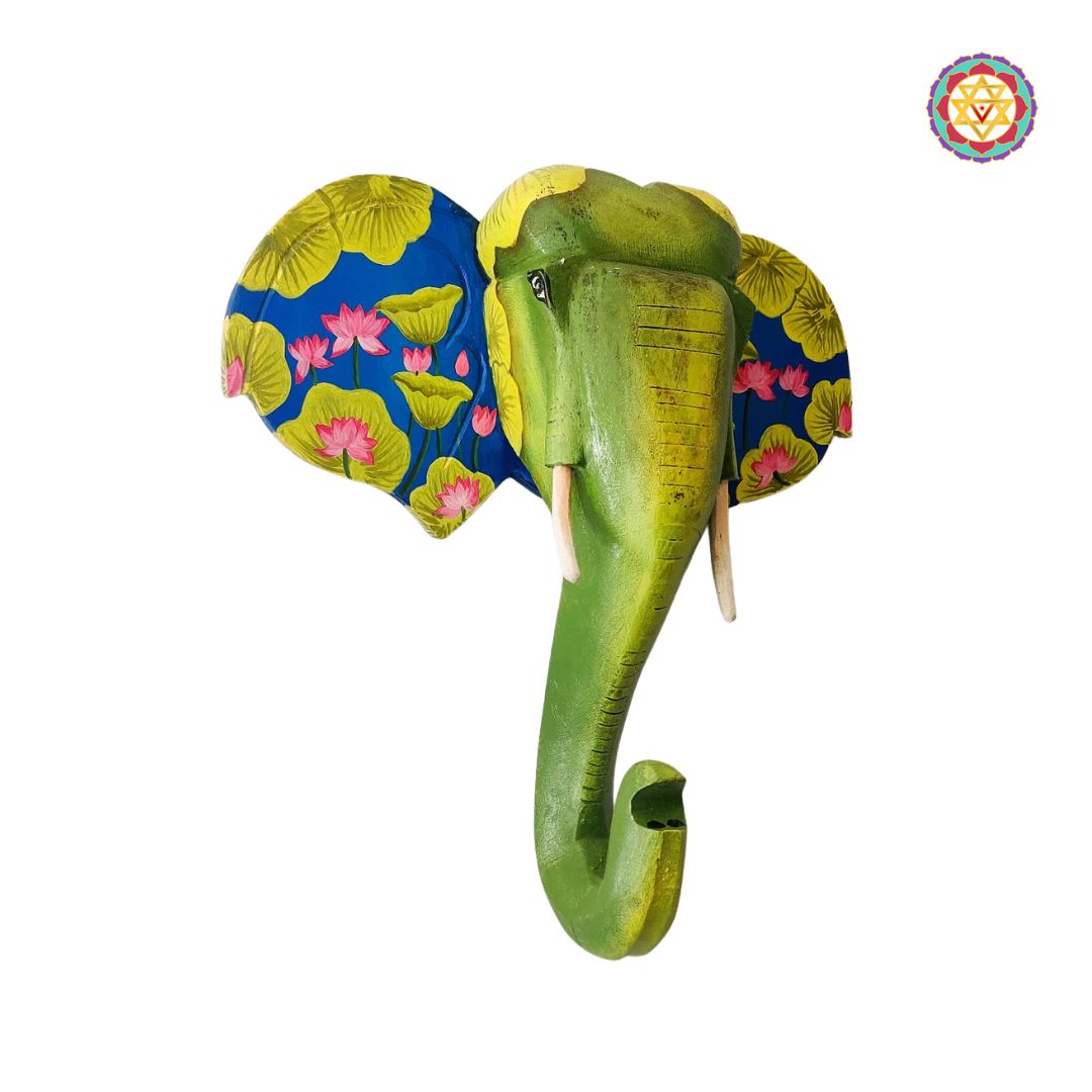 Side view of wooden elephant wall sculpture with antique finish