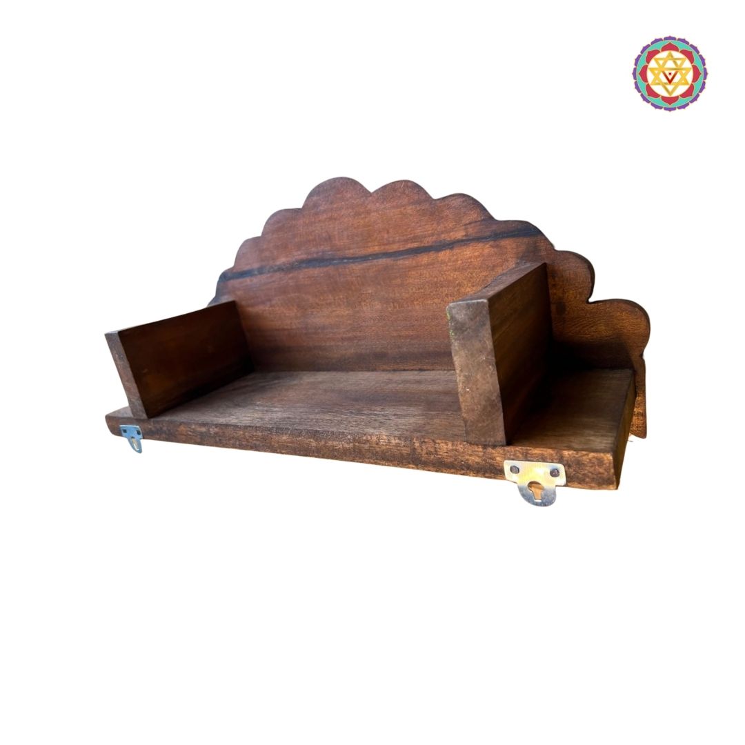 Side view of wooden annam wall shelf showing detailed swan motifs