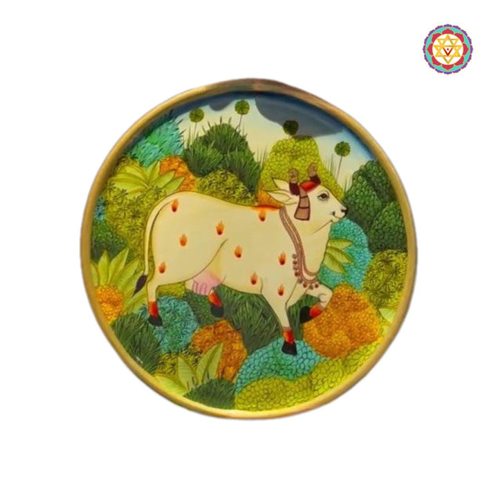 Hand painted wall plate with cow and floral landscape, pichwai design