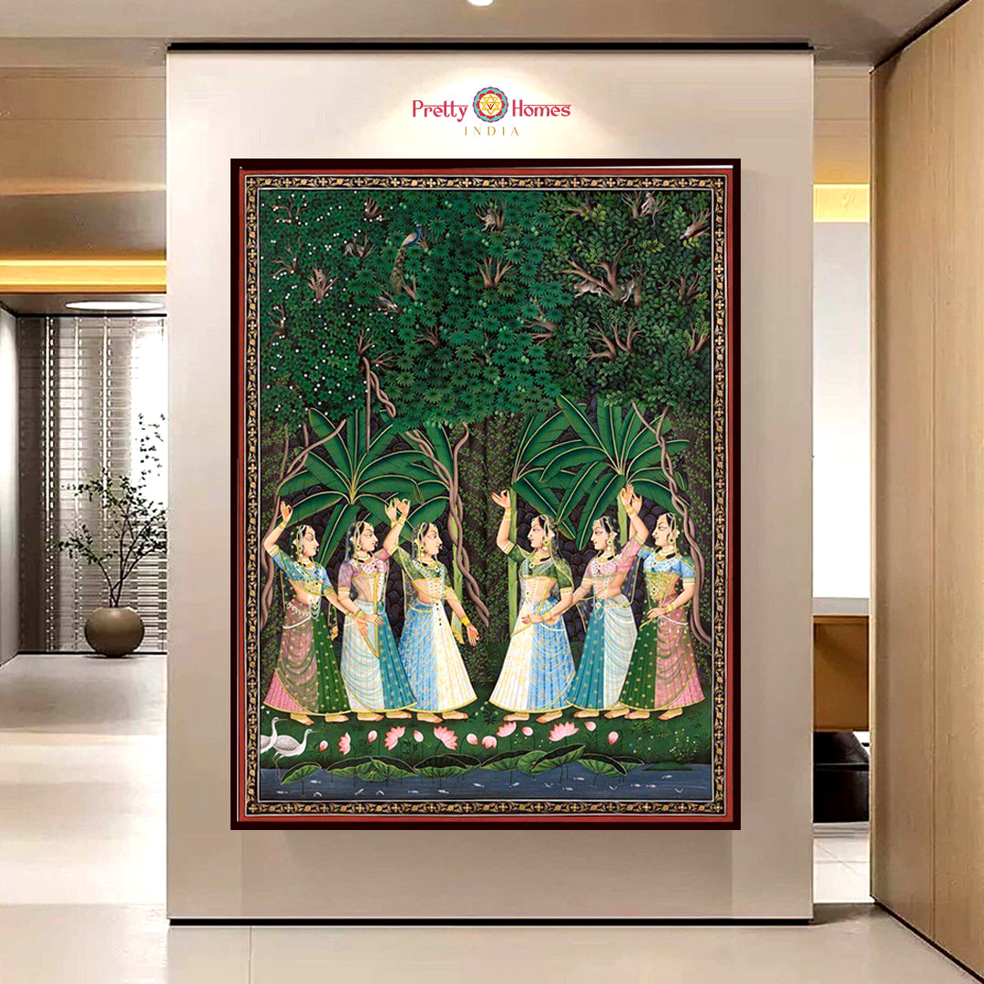 Raas leela painting of gopis dancing under lush trees detailed pichwai style wall art staged in hallway