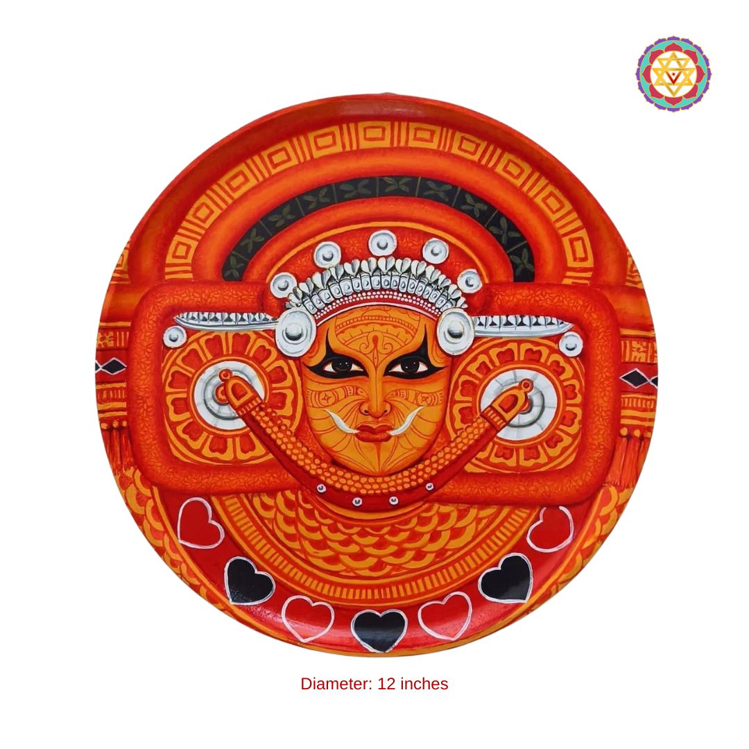 close-up of Theyyam handpainted wall plate showing intricate Kerala folk art patterns