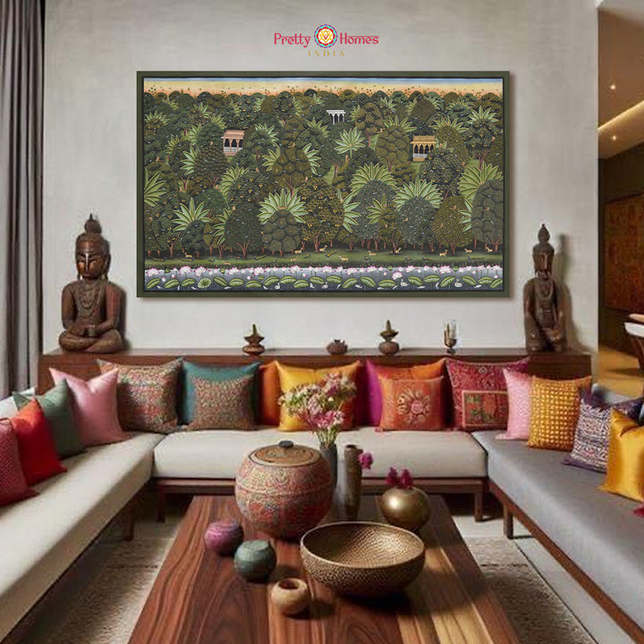 Hand-painted pichwai of Van Vihar jungle scene with trees and lotuses, displayed in a cozy traditional living room.