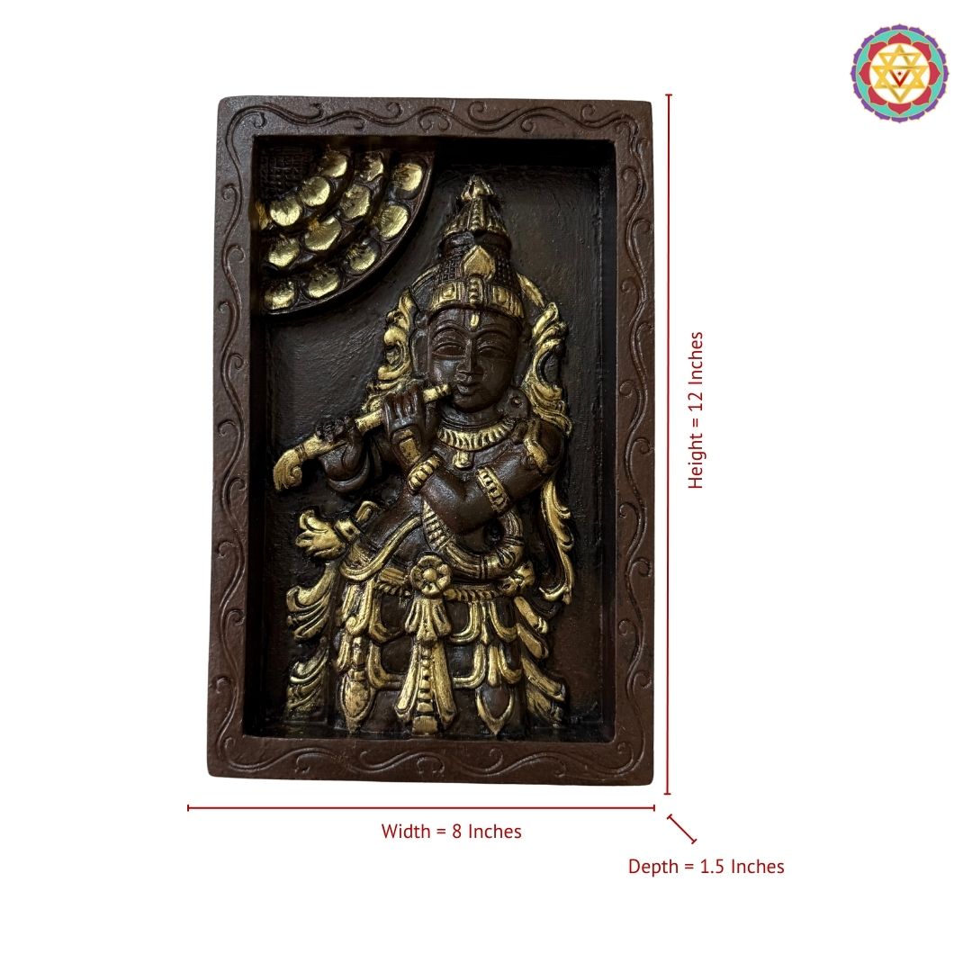 Detailed wooden carving of Krishna with flute in antique gold frame