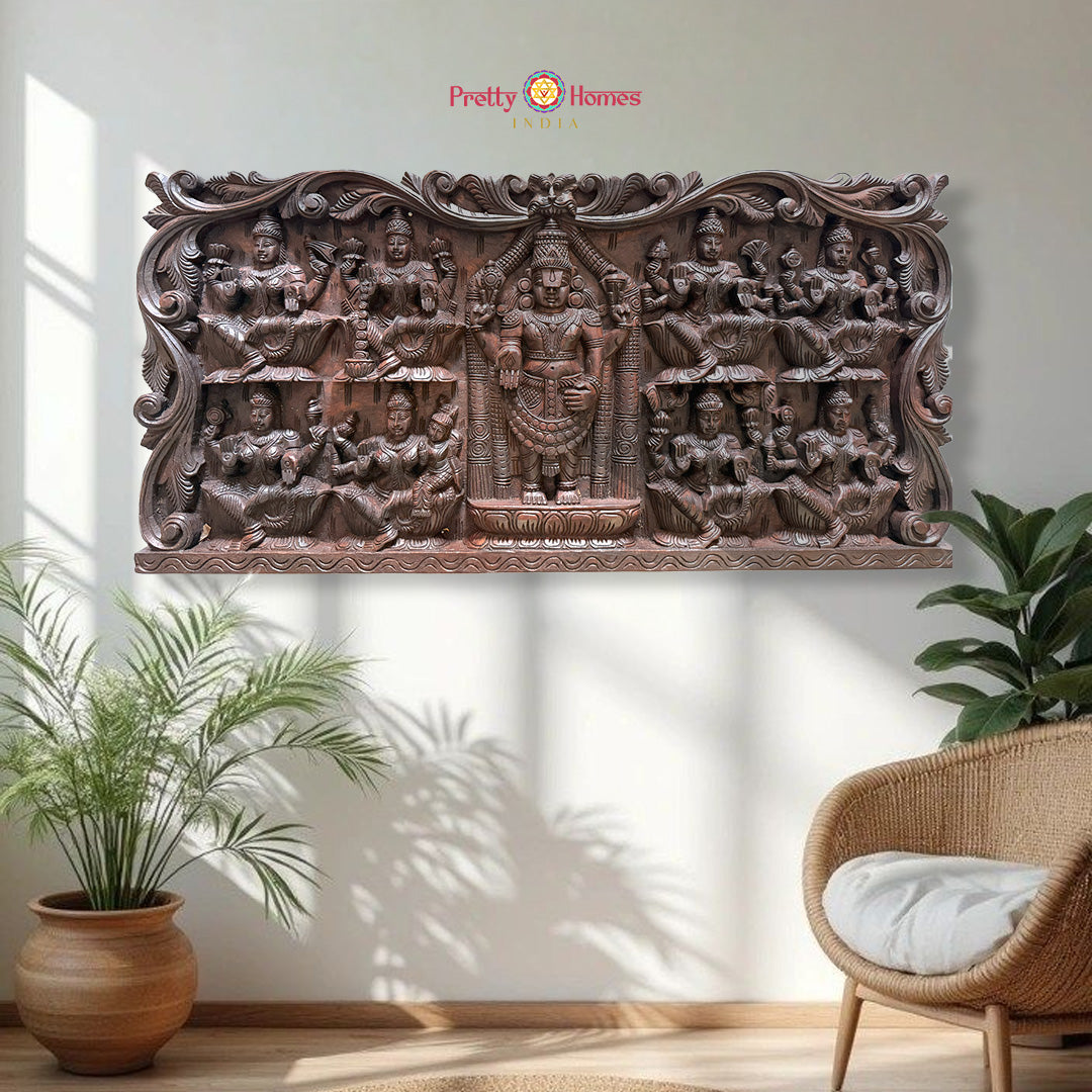 Decorative wooden wall panel with carvings in a room with plants and a chair.