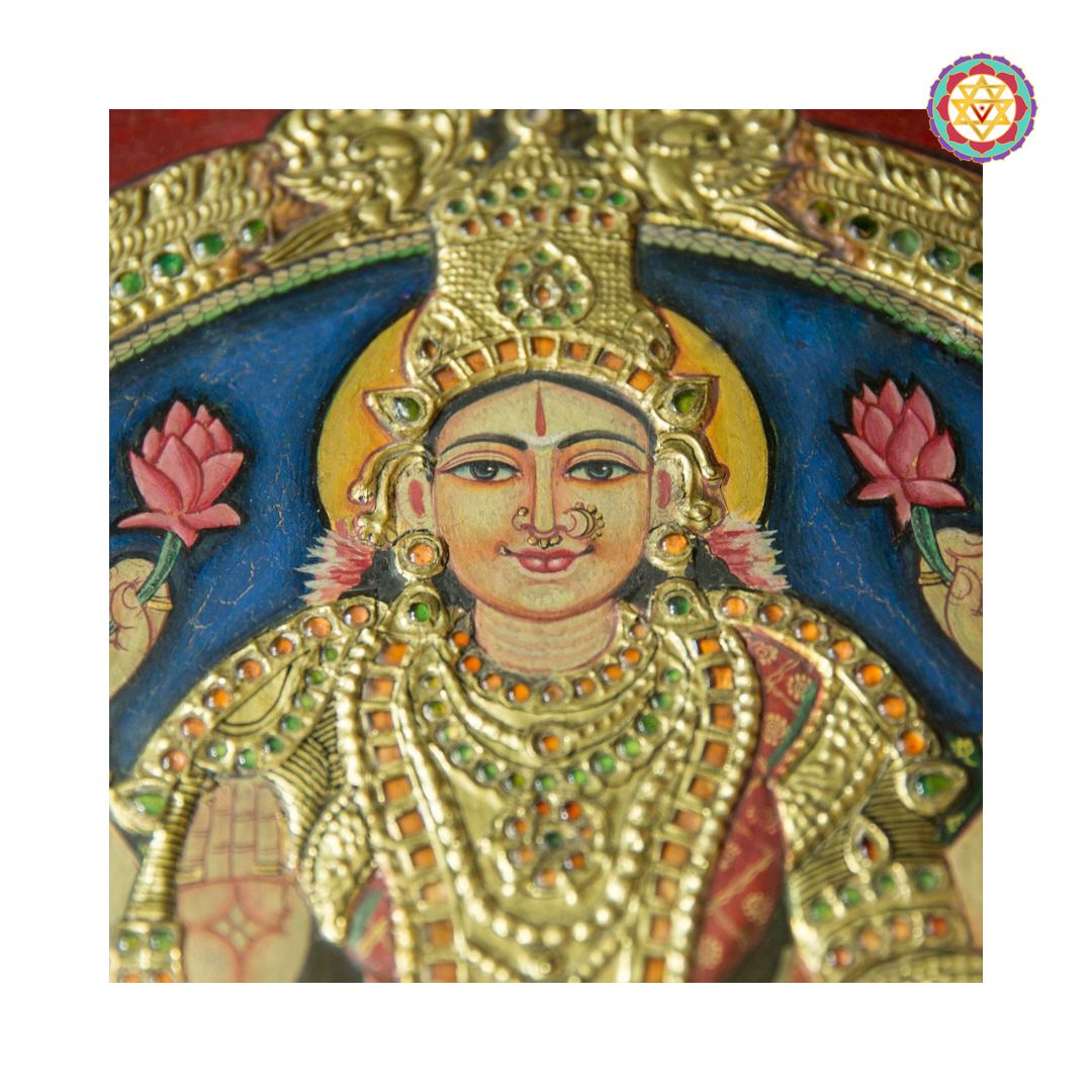 Close-up of 22-carat gold foil and traditional tanjore art brushwork