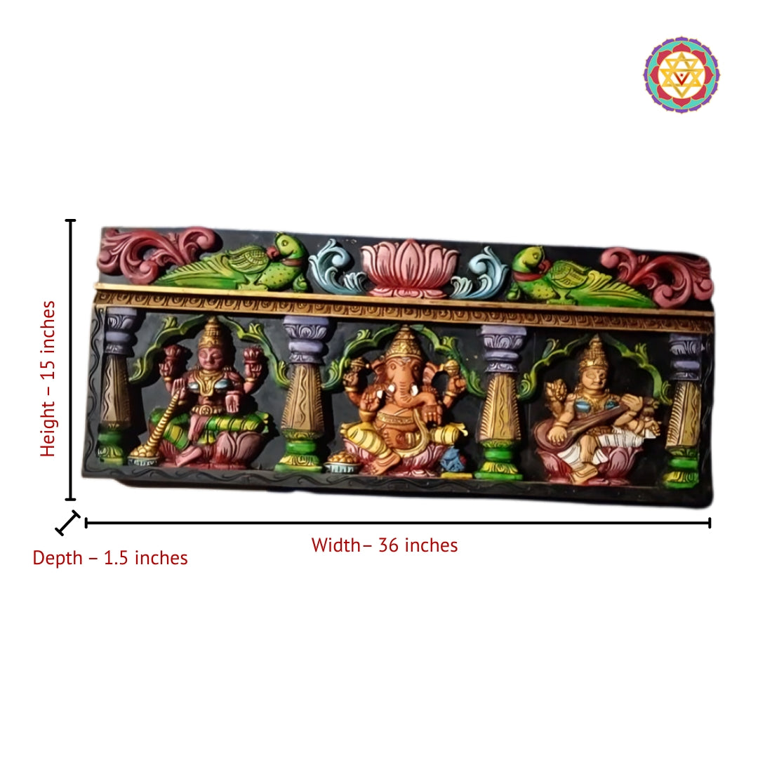 Traditional Indian wooden carved wall art featuring Ganesha Lakshmi Saraswati with intricate lotus motifs