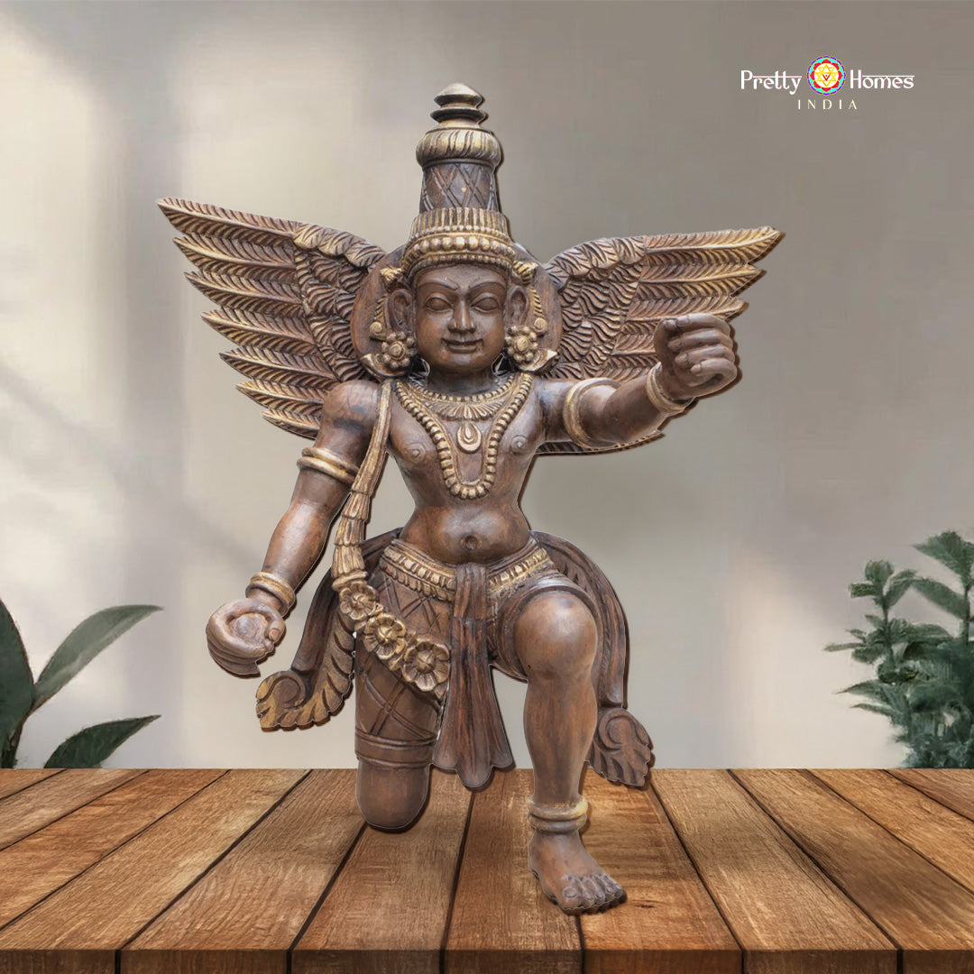 woodcarved sitting tabletop garuda statue front view symbol of devotion and protection