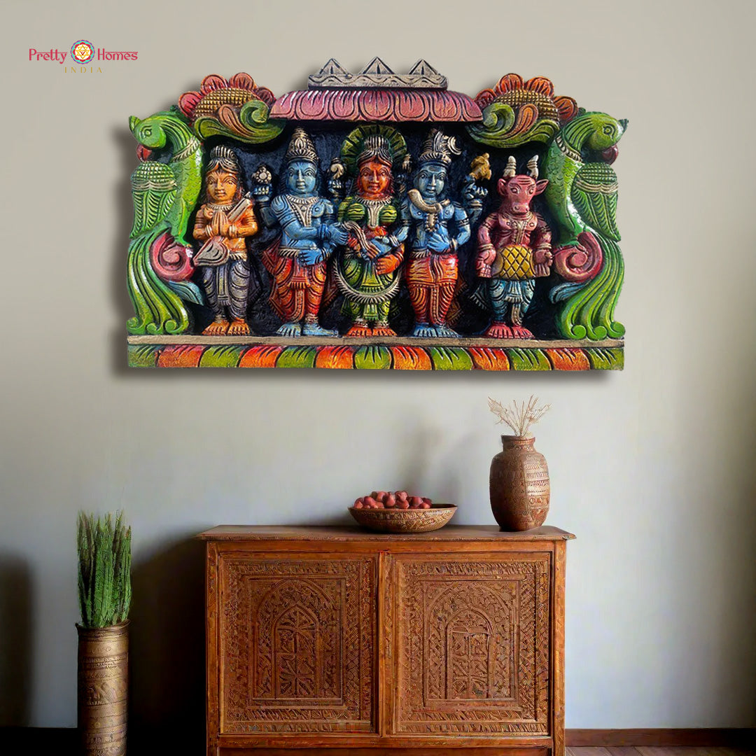 Hand-carved Meenakshi Kalyanam panel showing Shiva and Parvati full view