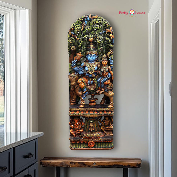 Wood carved panel of Shiva Parvati seated on Nandi with detailed canopy design