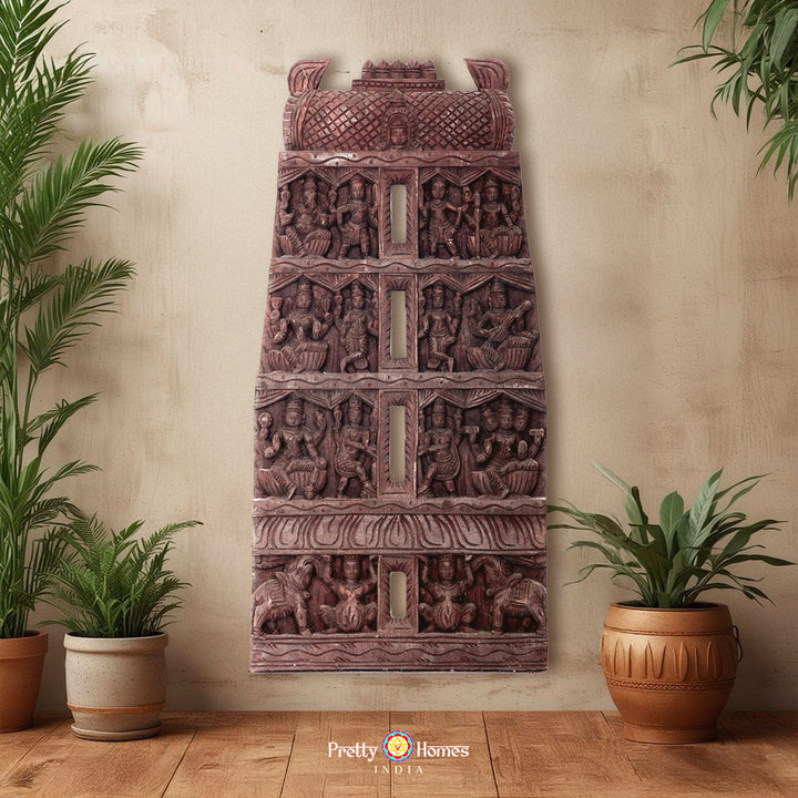 Tall temple gopuram design carved wall panel with layered Hindu deities