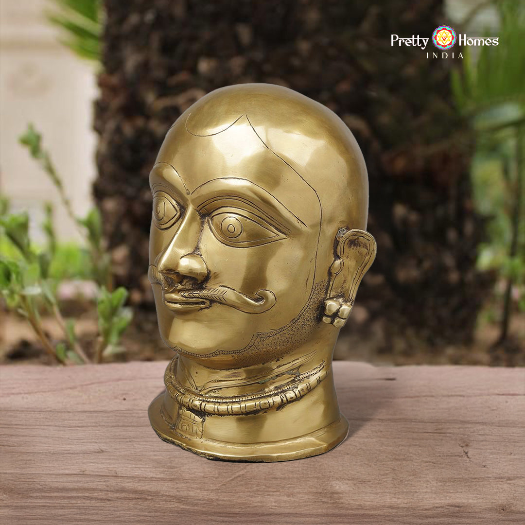 brass Shiva mukhalingam idol with handcrafted detailing and polished finish