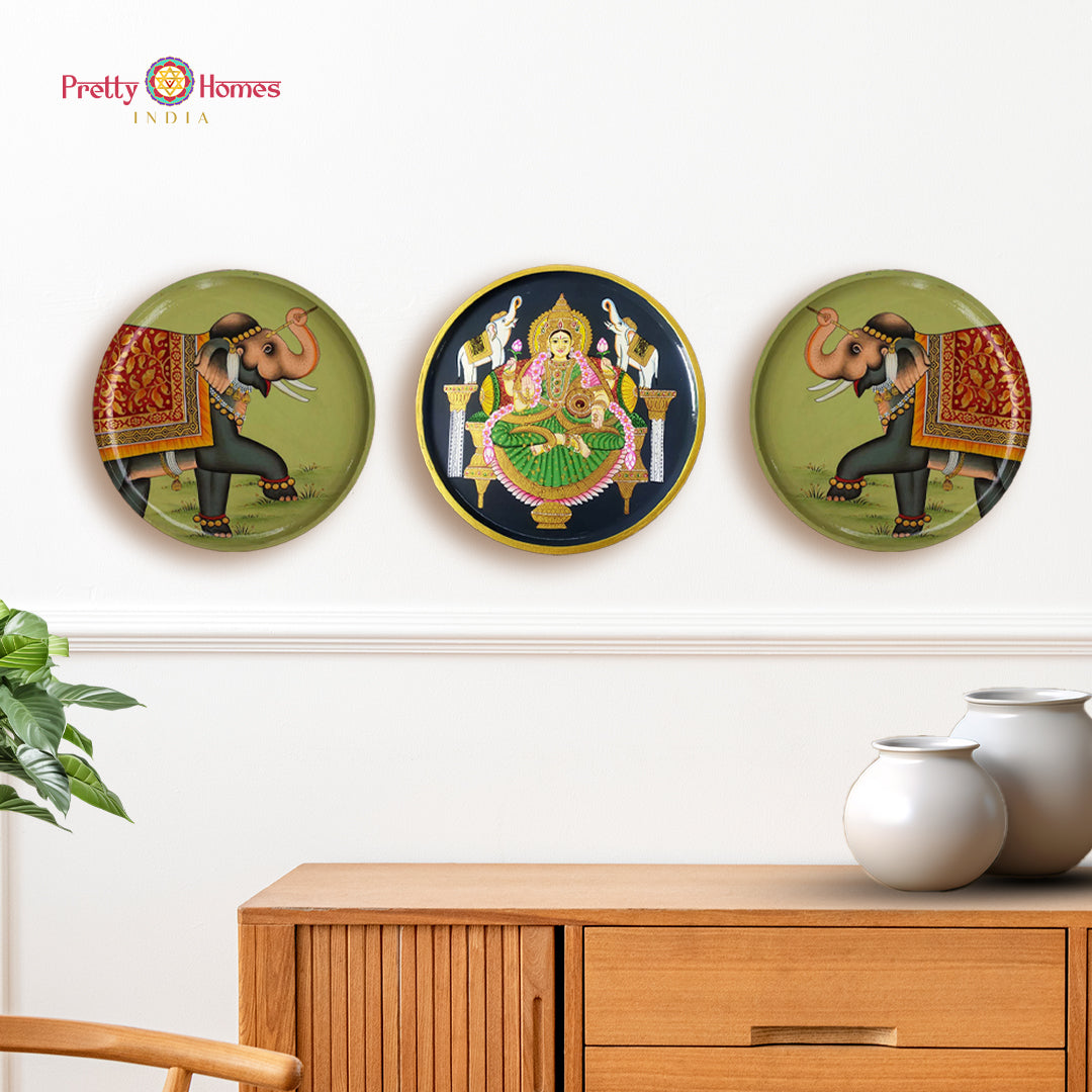 Handcrafted wall plate with Gajalakshmi and elephant detail for altar or entryway