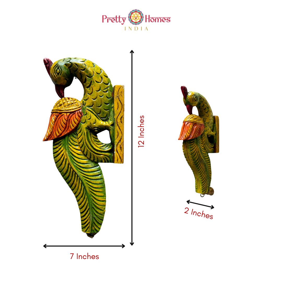 Detailed close-up of parrot carving pair — teak wood craftsmanship, antique gold brown finish