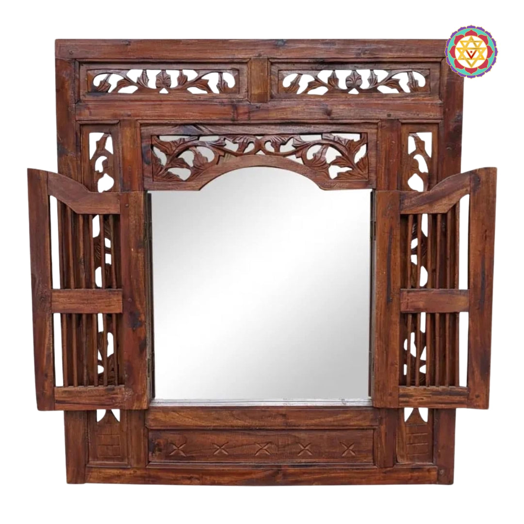 Open frame with mirror insert and detailed woodwork