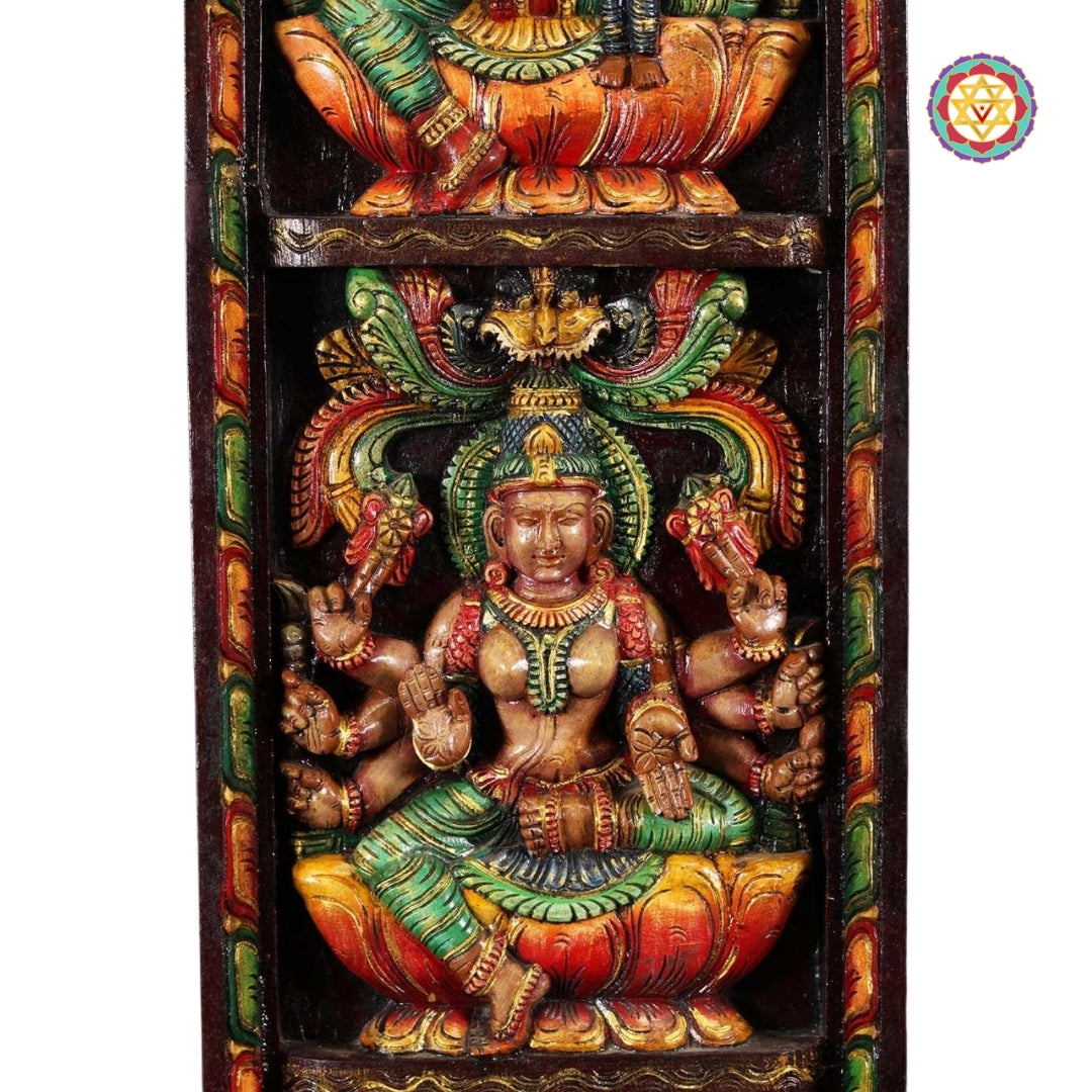 Aadi Lakshmi carving at top of left panel – Primordial Wealth