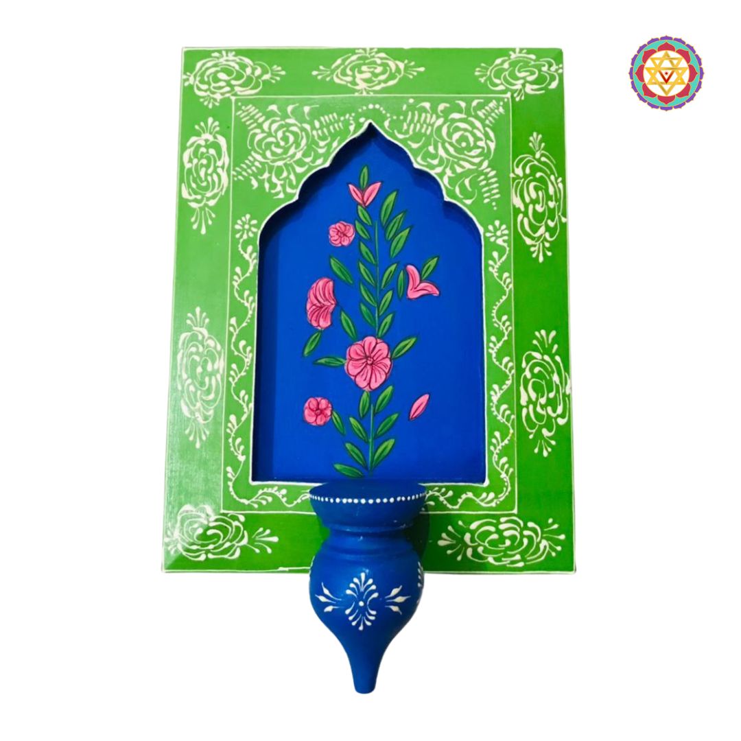 Green painted wooden frame with blue accents and folk figures