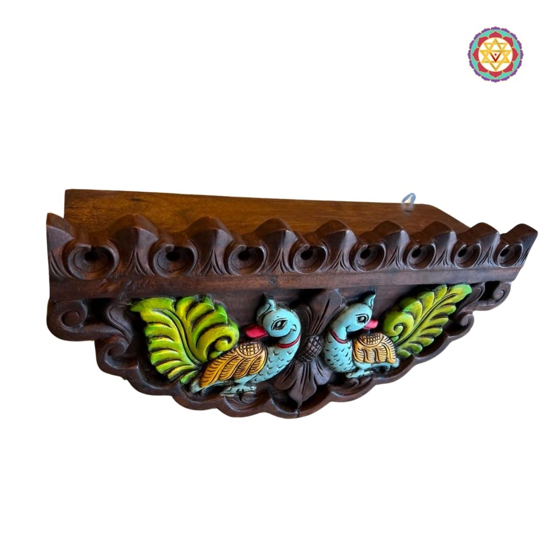 Traditional annapakshi carving on handcrafted wall-mounted wooden shelf
