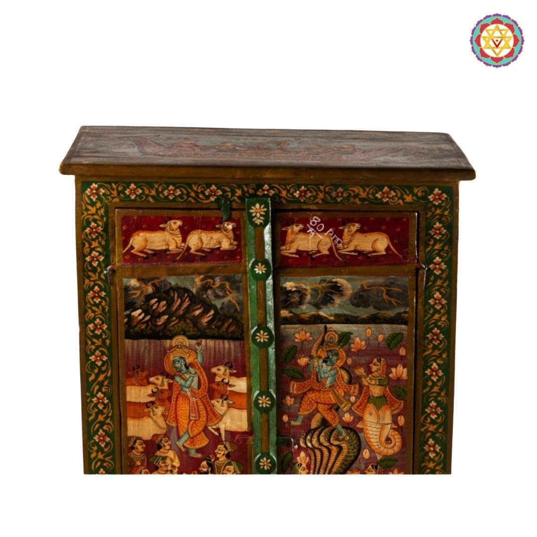 Side profile view of Pichwai inspired wooden storage cabinet