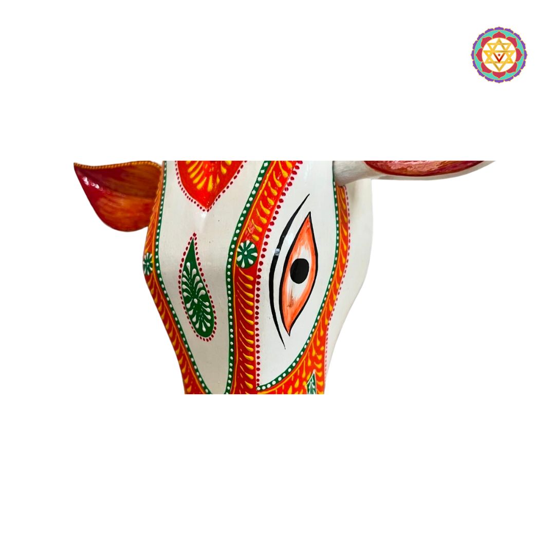 Close-up of Nandi cow head showing fine detailing and antique polish