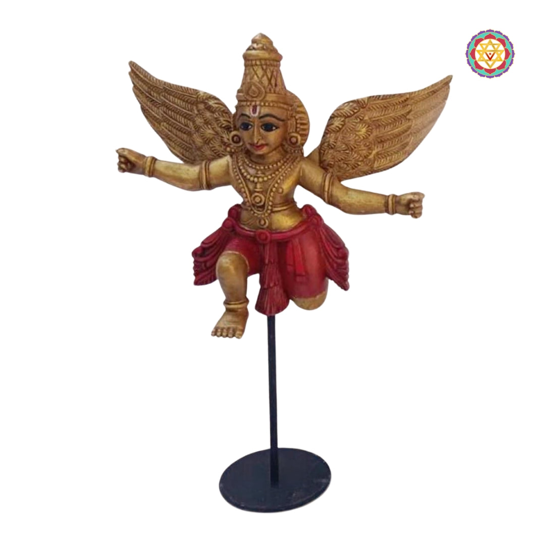 Side profile of Gandharva Indian angel sculpture on stand — intricate wood carving with flowing robe and halo pattern