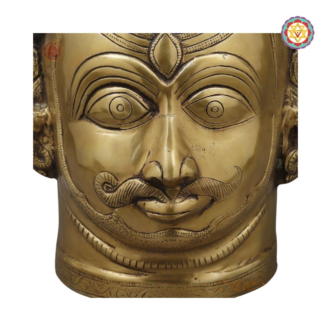 top-angle shot of brass Shiva face showing fine detailing